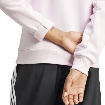 Εσωτερική υφή και μανσέτα γυναικείου φούτερ Adidas Essentials Feelcozy Small Logo σε ροζ χρώμα.